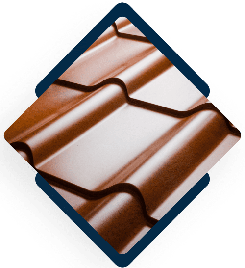 Modern ceramic roof tiles in brown and beige colors arranged in overlapping pattern