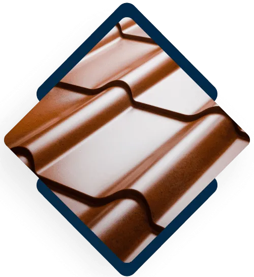 Modern ceramic roof tiles in brown and beige colors arranged in overlapping pattern
