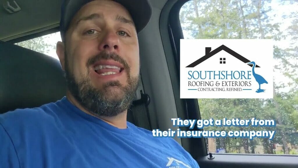 Man in blue shirt sitting in car discussing insurance letter with Southshore Roofing logo