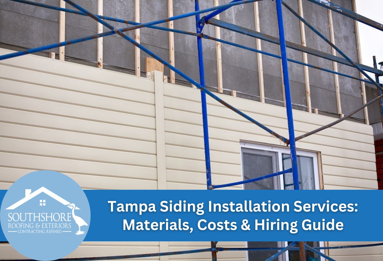 Siding installation project with scaffolding displaying construction progress.